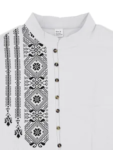 Macro detail view of men's linen Henley shirt featuring black ethnic geometric print