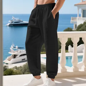 Men's breathable black linen joggers showing fabric texture and drawstring waist detail