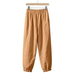 Detail of men's summer linen joggers showing breathable fabric and elastic cuffs