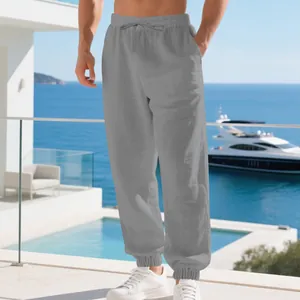 Close-up of breathable grey cotton-linen beach joggers with elastic drawstring waist