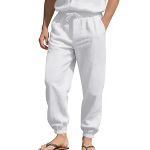 Detailed view of white breathable linen cotton jogger pants for men with drawstring waist
