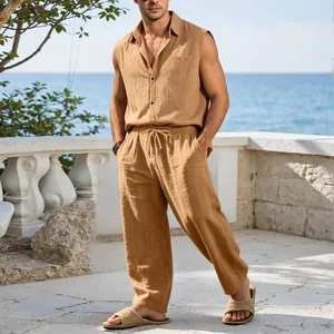 Detailed view of men's tan sleeveless linen set outfit during casual seaside vacation