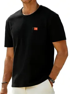 Men's casual black cotton T-shirt featuring a stylish chest pocket with orange patch.