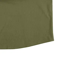Detailed macro view of olive green linen shirt hem showing precise stitching and fabric texture