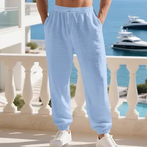 Men's light blue cotton linen joggers with elastic waist and drawstring for beach wear