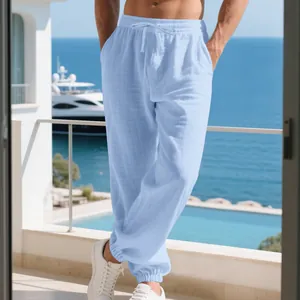 Comfortable men's light blue breathable linen jogger pants for summer beach vacations