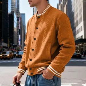 Close-up of men's orange knitted baseball jacket featuring cable pattern texture