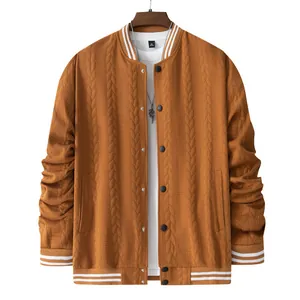 Detailed view of ginger men's knit varsity jacket with cable pattern and striped cuffs