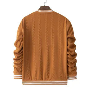 Detailed back view of men's orange cable knit jacket featuring striped ribbed trim