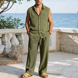 Detail view of men's olive green linen sleeveless shirt and trousers set for beach vacation