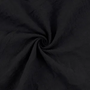 Detailed macro texture of breathable black cotton-linen fabric for men's casual pants