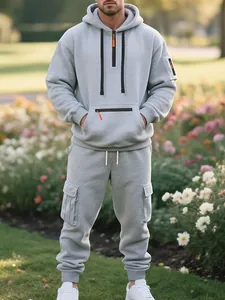 Men's oversized grey fleece tracksuit set with multi-pocket joggers and hoodie set.