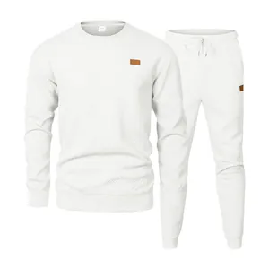 Elegant white men's two-piece sports leisure suit featuring textured jacquard knit pattern