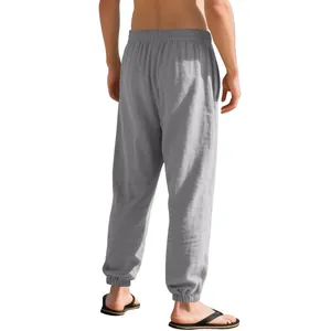 Detailed back view of men's loose breathable linen joggers with elastic cuffs in gray