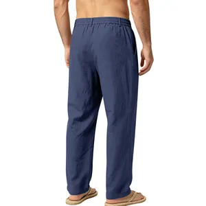 Rear view of men's loose blue linen pants featuring a comfortable straight leg fit.