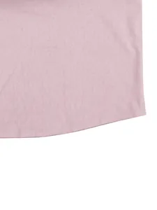 Close-up detail of the curved hem stitching and breathable linen fabric on men's pink shirt