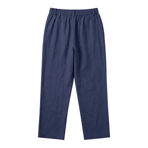Detail view of navy blue linen men's casual pants with elastic waistband texture