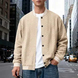 Close-up detail of men's loose cable-knit baseball jacket with striped ribbed collar