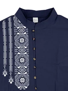 Close-up of navy blue linen shirt with white tribal print and collar label
