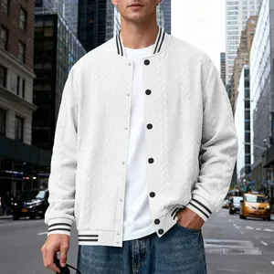 Detailed view of white cable knit men's baseball jacket with striped cuffs