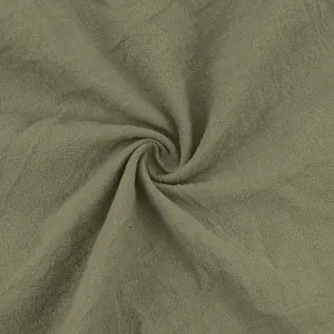 Macro view of olive green breathable linen cotton fabric texture for men's pants