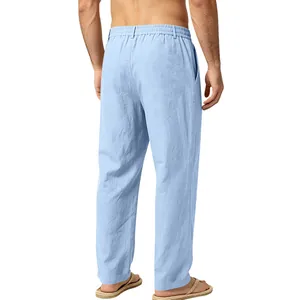 Back view showing the detailed texture of men's loose light blue linen straight trousers