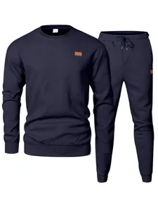 Navy blue men's textured knit sweatshirt and joggers matching tracksuit set for casual wear