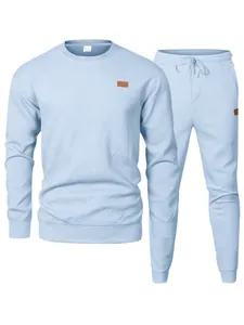 Men's light blue jacquard knit 2-piece tracksuit set with crewneck top and pants