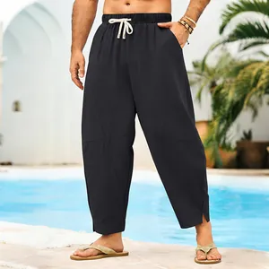 Détail du pantalon large hip-hop noir pour hommes avec ourlet fendu et cordon réglable