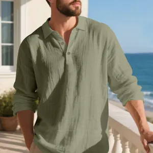 Detailed macro view of men's sage green linen long sleeve shirt for beach vacation
