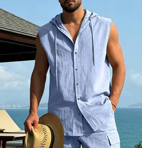 Close-up of men's light blue sleeveless linen hooded shirt in a vacation setting
