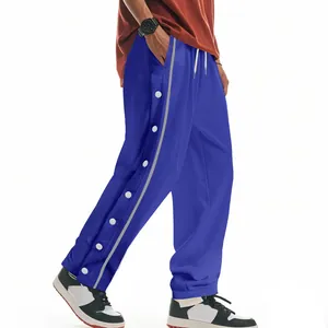 Détail du pantalon de basket hip-hop bleu pour homme avec boutons latéraux