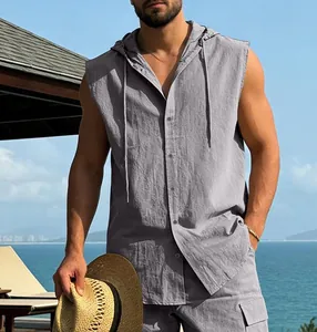 Detail view of men's gray linen hooded sleeveless shirt in a seaside resort setting