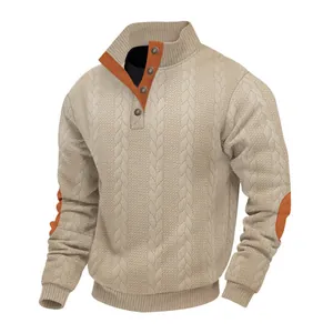 Detail view of men's beige cable knit sweater with button collar and tan elbow patches
