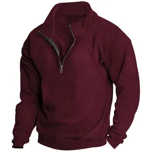Detail view of burgundy men's fleece sweatshirt featuring a half-zipper stand collar