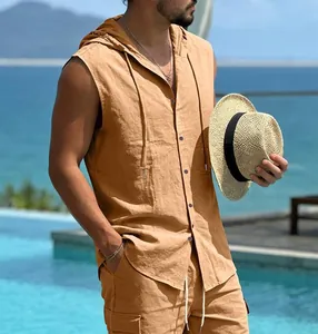 Detailed view of men's casual ginger linen hooded sleeveless shirt in a tropical pool setting
