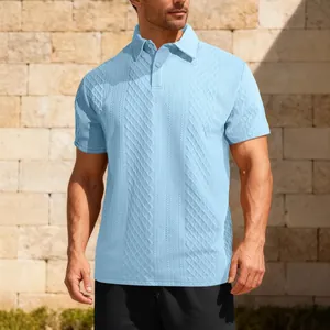 Detailed view of light blue men's polo shirt featuring intricate jacquard texture