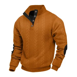 Men's orange cable-knit pullover featuring black button collar and elbow patches.