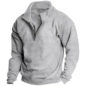 Detailed view of a premium men's grey half-zip sweatshirt with soft fleece texture