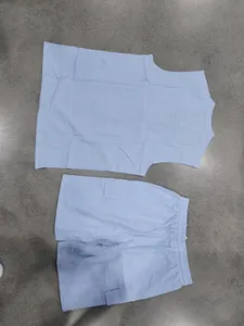 Summer two-piece men's light blue linen set with sleeveless tank top and cargo shorts