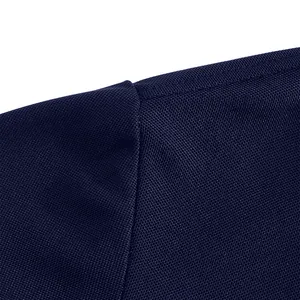 Close-up of shoulder seam detail on breathable navy blue Polo shirt