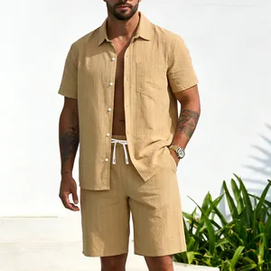 Detail view of men's beige striped linen shirt and shorts set with pinstripe texture.