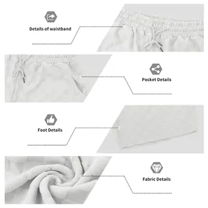 Makro-Detailansicht der weißen Shorts mit Schachbrettmuster, Bund und Stoffqualität