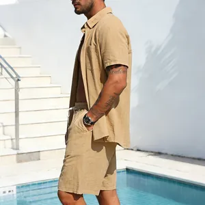 Side view of men's linen striped short sleeve shirt and shorts set by the pool