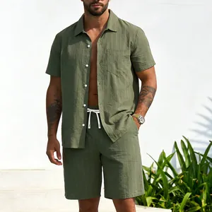 Outdoor shot showing the fit of men's green striped linen short sleeve shirt and shorts