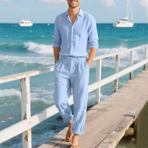 Full body view of light blue men's linen shirt and pants set on a sunny beach pier