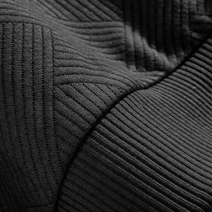 Macro detail showing high-quality jacquard texture on heavy American retro sweatshirt