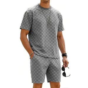 Graues strukturiertes Schachbrett Kurzarm T-Shirt und Shorts Set für Herren Freizeit