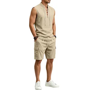 Detailed view of men's summer linen sleeveless lace-up shirt and cargo shorts set in beige