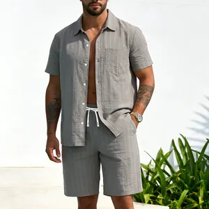 Full view of men's grey striped linen short sleeve shirt and shorts set on model